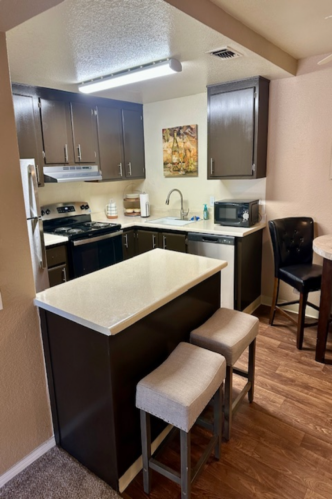 Thank you for viewing our Living, kitchen, dining 10 at Walnut Village Apartments in the city of Sacramento.